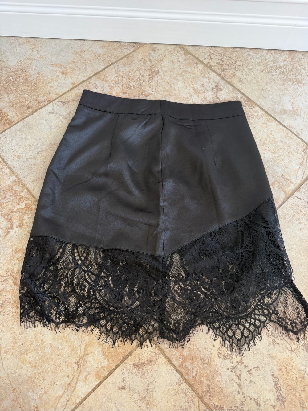 Black lace mini skirt